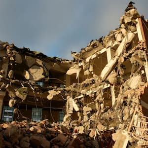 Spotlight story image pertaining to destroyed building with rubble