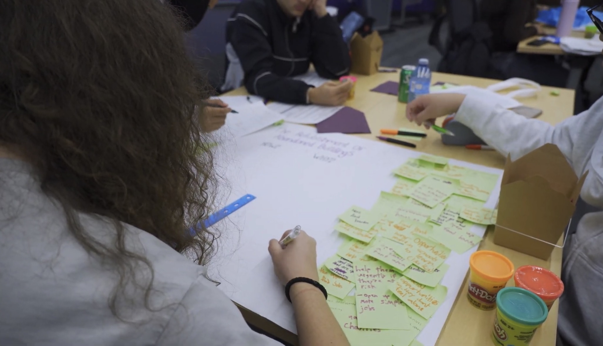 Student completing a Building Bridges activity