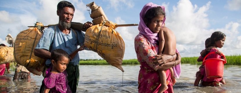 Rohingya Refugees Crossing a River