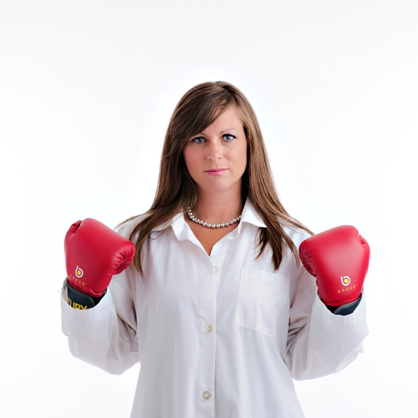 a woman with boxing gloves