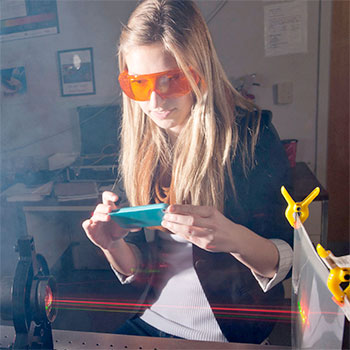women student doing science 