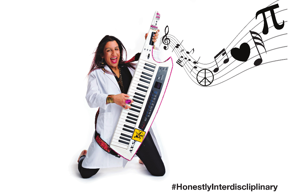 a woman plays the keytar