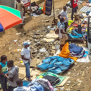 Spotlight story image pertaining to african vendors on street