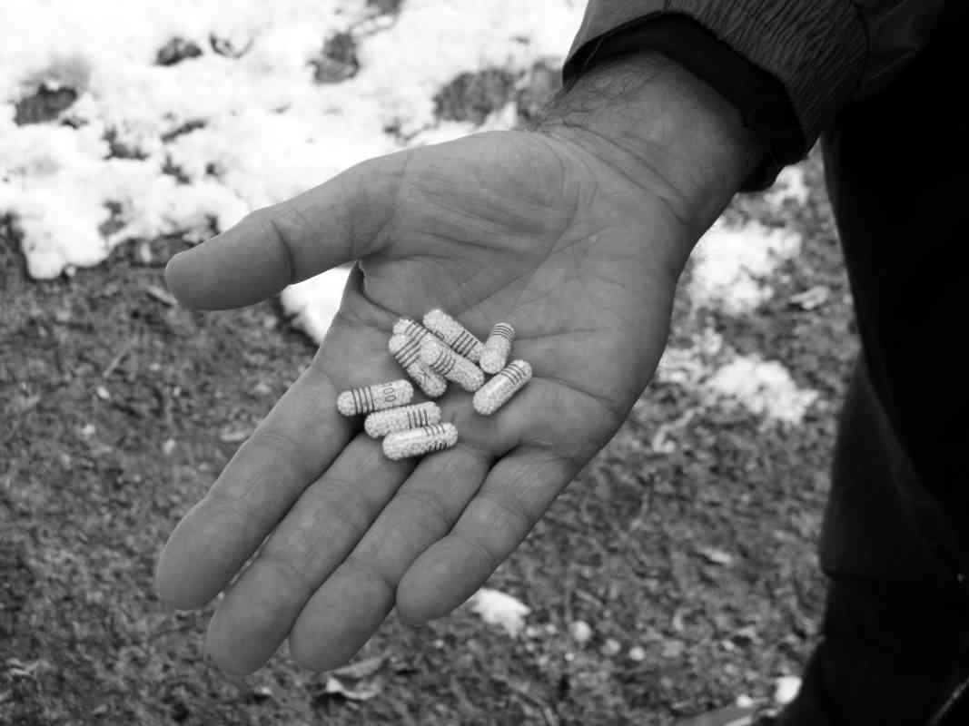 hand showing pills