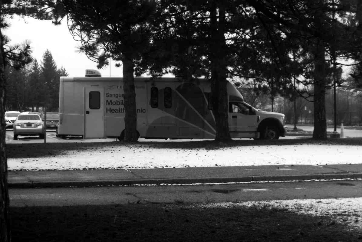 Mobile Health Clinic truck parked at park edge